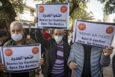 Des membres de l'Association nationale des agences de voyage du Maroc (FNAVM) manifestent pour l'ouverture des frontières, à Rabat, le 26 janvier 2022