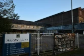 Sur les grilles de l'usine d'ArjoWiggins à Besse-sur-Braye (Sarthe), le slogan peint sur une bâche "Arjo fermée = région sinistrée" le 20 février 2019