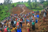 Photo publiée le 22 juillet 2024 par le département de la communication de la zone administrative de Gofa, dans le sud-ouest de l'Ethiopie, montrant des personnes sur les lieux d'un glissement de terrain