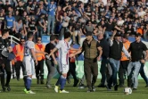 Des supporters de Bastia envahissent la pelouse de Furiani à la mi-temps du match face à Lyon, le 16 avril 2017