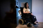 Marina Lissovaïa, clouée dans un fauteuil roulant par une amyotrophie spinale, chez elle à Moscou le 10 novembre 2021