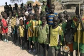 Des enfants attendent une distribution alimentaire du PAM dans un camp de déplacés de l'Etat de Jonglei, le 13 février 2016