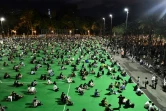Des militants pro-démocratie marquent l'anniversaire de la répression sanglante de Tiananmen à Pékin, après que le rassemblement annuel habituel a été interdit par les autorités au nom de la lutte anti-Covid, le 4 juin 20230 à Hong Kong 