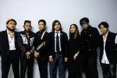 Le groupe de heavy metal thaïlandais Defying Decay pose avant leur concert à Bangkok le 12 février 2022