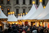 Des visiteurs se pressent sur un marché de Noël traditionnel à Berlin, le 24 décembre 2024