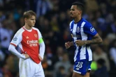 La déception du capitaine d'Arsenal Martin Odegaard (g) après la défaite à Porto, en 8e aller de la Ligue des champions, le 21 février 2024 à Porto