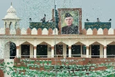 Le portrait de Muhammad Ali Jinnah, fondateur du Pakistan, est érigé pour célébrer l'indépendance du pays, le 14 août 2017 au poste frontière de Wagah, à la frontière avec l'Inde