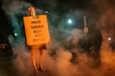 Un manifestant contre les violences policières et le racisme aux Etats-Unis, à Kenosha le 24 août 2020
