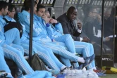 Basile Boli sur le banc de l'OM lors du match à Angers, le 1er mai 2016