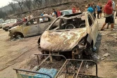 Photo diffusée sur la page Facebook de la Radio Soummam Bejaia, le 24 juillet 2023, montrant des véhicules calcinés après des incendies de forêts à Toudja, en Algérie