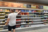 Des étagères vides dans un supermarché Tesco à Londres le 22 juillet 2021