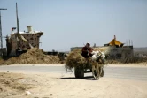 Une femme palestinienne dans la zone où étaient basés des militants du Hamas, dans la bande de Gaza, le 5 mai 2016