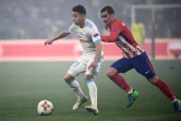 Le milieu de l'OM Maxime Lopez (g) à la lutte avec l'attaquant de l'Atlético Madrid Antoine Griezmann en finale de l'Europa League au Parc OL, le 16 mai 2018