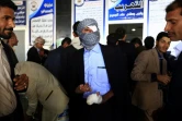 Un rebelle yéménite blessé dans l'attente de son évacuation vers Oman, le 3 décembre 2018 à l'aéroport international de Sanaa