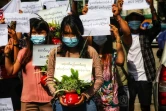 Photo prise et diffusée le 13 avril 2021 par une source anonyme via Facebook d'une manifestation à Rangoun contre le coup d'Etat militaire en Birmanie