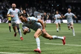 Juan Imhoff file marquer l'essai de la victoire du Racing 92 sur les Saracens en demi-finale de la Coupe d'Europe de rugby le 26 septembre 2020 à Nanterre