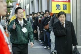 File d'attente à Tokyo pour la sortie de la Nintendo DS le 2 decembre 2024