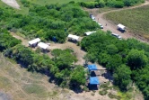 Des médecins légistes recherchent des restes humains sur le site de la Bartolina, au Mexique, le 23 août 2021