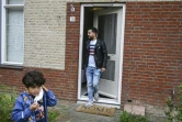 Ahmed et Adam devant le nouveau foyer de la famille à Duiven aux Pays-Bas, le 23 septembre 2020