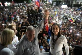 Le candidat de l'opposition à l'élection présidentielle vénézuélienne Edmundo Gonzalez Urrutia (à gauche) avec la leader de l'opposition Maria Corina Machado, le 25 juillet 2024 à Caracas