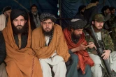 Des combattants talibans assistent au championnat d'Afghanistan de bouzkachi à Kaboul, le 6 mars 2022