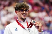 Le Français Alexandre Leauté sur le podium de l'épreuve du contre-la-montre C1-3 1000 m hommes lors des Jeux paralympiques de Paris 2024, au vélodrome national de Saint-Quentin-en-Yvelines, le 31 août 2024