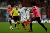 L'attaquant Wayne Rooney (c) lors de sa dernière sélection en équipe d'Angleterre face à l'Ecosse en qualif pour le Mondial-2018, le 11 novembre 2016 à Londres