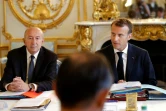 Emmanuel Macron et Gérard Collomb lors du conseil des ministres du 3 août 2018