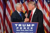 Mike Pence et Donald Trump, sur scène devant leur supporteurs à New York, le 9 novembre 2016 après l'annonce de leur victoire à la présidence et vice-présidence des Etats-Unis