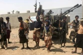 Des combattants des forces yéménites pro-gouvernementales lors d'une offensive contre les rebelles houthis près de l'aéroport de Hodeida, le 18 juin 2018