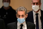 L'ancien président Nicolas Sarkozy arrive le 7 décembre 2020 au tribunal de Paris lors du procès dit "des écoutes"