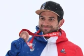La joie du Français Mathieu Faivre, médaillé de bronze du géant des Jeux olympiques de Pékin, le 13 février 2022 au centre national de ski alpin de Yanqing