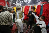 Préparatifs avant le rituel du deuil lors des célébrations de l'Achoura, à Noosh Abad dans le centre de l'Iran le 26 juillet 2023