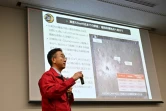 Shinichiro Sakai, chef de projet SLIM de la Jaxa, explique les résultats de la mission du module lunaire SLIM lors d'une conférence de presse à Tokyo, le 25 janvier 2024