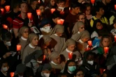 Des milliers de fidèles rassemblés pour la cérémonie du "Chemin de croix", présidée par le pape François, au Colisée de Rome, le 15 avril 2022