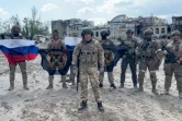 Image tirée d'une vidéo postée sur le compte Telegram du service de presse Concord, montrant Evguéni Prigojine et des combattants du groupe paramilitaire russe Wagner, le 20 mai 2023 à Bakhmout, en Ukraine