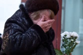 Une femme en pleurs le 25 décembre 2016 devant l'immeuble de l'Ensemble Alexandrov à Moscou 