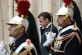 Le président français Emmanuel Macron sur le perron du palais de l'Elysée à Paris le 27 mars 2017