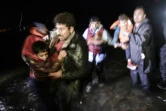 Des réfugiés arrivent le 20 novembre 2015 sur l'île grecque de Lesbos depuis la Turquie