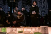Cérémonie matinale à la mémoire des victimes à l'occasion du 30e anniversaire du tremblement de terre de Kobe, le 17 janvier 2025 au Japon