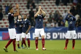 L'attaquant de l'équipe de France Olivier Giroud (au centre) à la fin du match amical de l'Euro-2016 contre l'Arménie (4-0) le 8 octobre 2015 à Nice