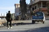 Soldats syriens le 3 avril 2016 à al-Quaryatayn dans la province de Homs 