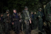 Des soldats thaïlandais près de la grotte Tham Luang dans la province de Chiang Rai le 6 juillet 2018