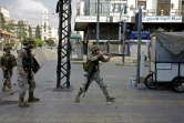 Des soldats dispersent les manifestants antigouvernementaux à Tripoli, dans le nord du Liban, le 28 avril 2020