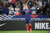 La joie de l'attaquant français Antoine Griezmann, après avoir marqué son 2e but face à la Finlande, lors des qualifications pour le Mondial-2022 au Qatar, le 7 septembre 2021 au Groupama Stadium à Décines-Charpieu, près de Lyon