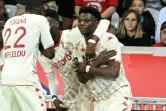 Le milieu de terrain monégasque Aurélien Tchouaméni, félicité par ses coéquipiers, après avoir marqué contre Lille, lors de la 36e journée de Ligue 1, le 6 mai 2022 au Stade Pierre-Mauroy à Villeneuve-d'Ascq
