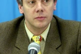 Gilles Beyer, alors entraîneur des équipes nationales, en conférence de presse aux championats d'Europe de patinage artistique, le 30 janvier 1999 à Prague   