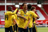 Le milieu espagnol d'Arsenal Dani Ceballos (c) vient de marquer le but de la victoire (2-1) sur le terrain de Sheffield, le 28 juin 2020
