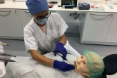 Pour améliorer la formation de ses étudiants, la Faculté de chirurgie dentaire de Strasbourg s'est dotée d'un mannequin hyperréaliste, une première en France, photographié le 25 septembre 2018 à Paris
