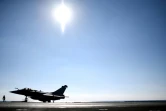 Un avion de chasse Rafale sur le pont d'envol du porte-avions Charles-de-Gaulle en Méditerranée le 12 décembre 2016